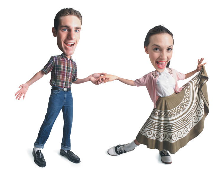 عکس کاریکاتور یک زن و شوهر جوان قفقازی در حالی که با هم می رقصند، لباس های یکپارچه سازی لباس پوشیده اند